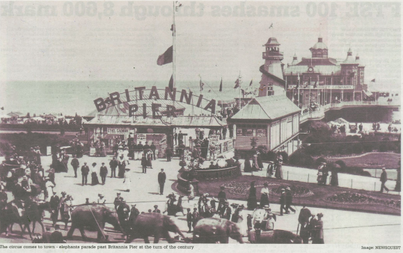 Historic photograph of Britannia Pier, Great Yarmouth, showcasing an elephant parade at the turn of the 20th century. This vintage image captures the rich architectural and cultural history of Norfolk’s coastal landmarks. Paul Robinson Partnership, leading architects in Norfolk, specialises in heritage architecture, contemporary design, and urban regeneration projects across Great Yarmouth and beyond. As expert designers in Norfolk, we embrace historical influences while crafting sustainable and innovative built environments. Discover our architectural expertise in Norfolk, blending heritage preservation with modern design solutions.